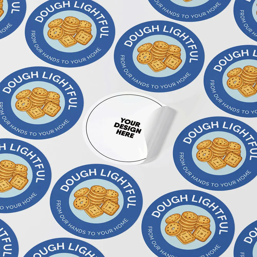 Sheet of round full-colour vinyl stickers with one sticker peeled up from the backing